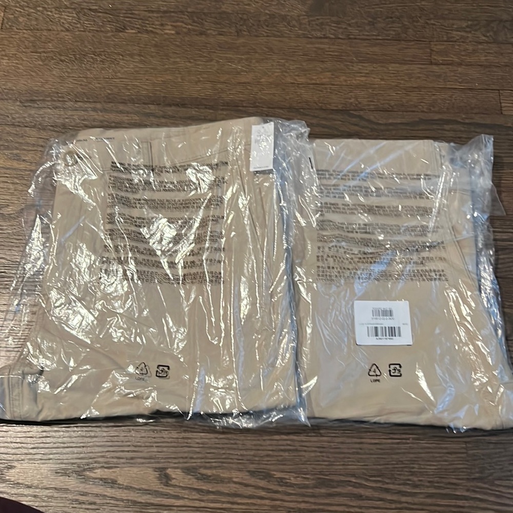 Two pairs in package of Old Navy 38 by 30 khakis.
